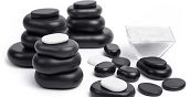 Trattamento con pietre calde che riequilibra Yin e Yang con pietre calde
